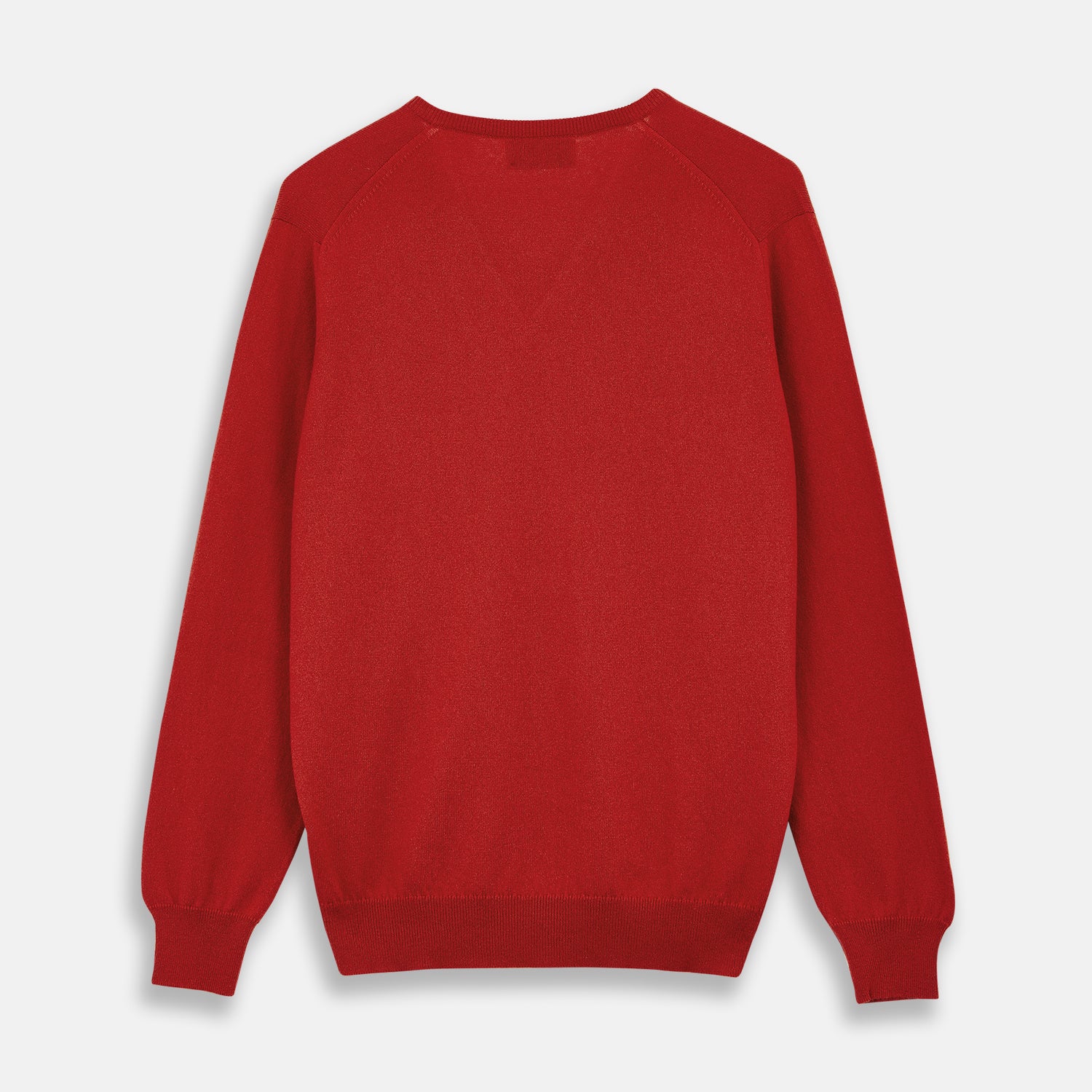 View 3 of product The Turnbull & Asser Red Cashmere V-Neck Jumper features long sleeves and ribbed cuffs and hem, shown laid flat on a white background.