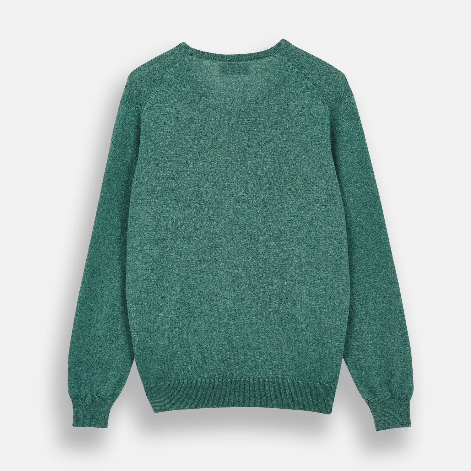 View 3 of product The Turnbull & Asser Green Cashmere V-Neck Jumper features long sleeves, ribbed cuffs and hem, and is styled in classic Scottish knitwear, shown flat against a white background.