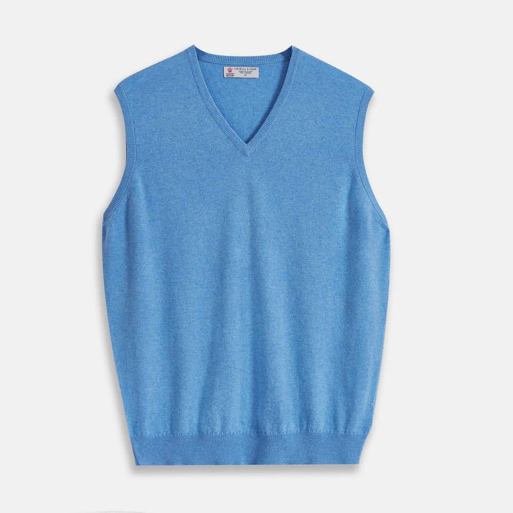 The Sky Blue Fine Cashmere Slipover by Turnbull & Asser is laid flat on a white background, showcasing its lightweight design and ribbed neckline, armholes, and hem for a refined finish.