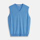 The Sky Blue Fine Cashmere Slipover by Turnbull & Asser is laid flat on a white background, showcasing its lightweight design and ribbed neckline, armholes, and hem for a refined finish.