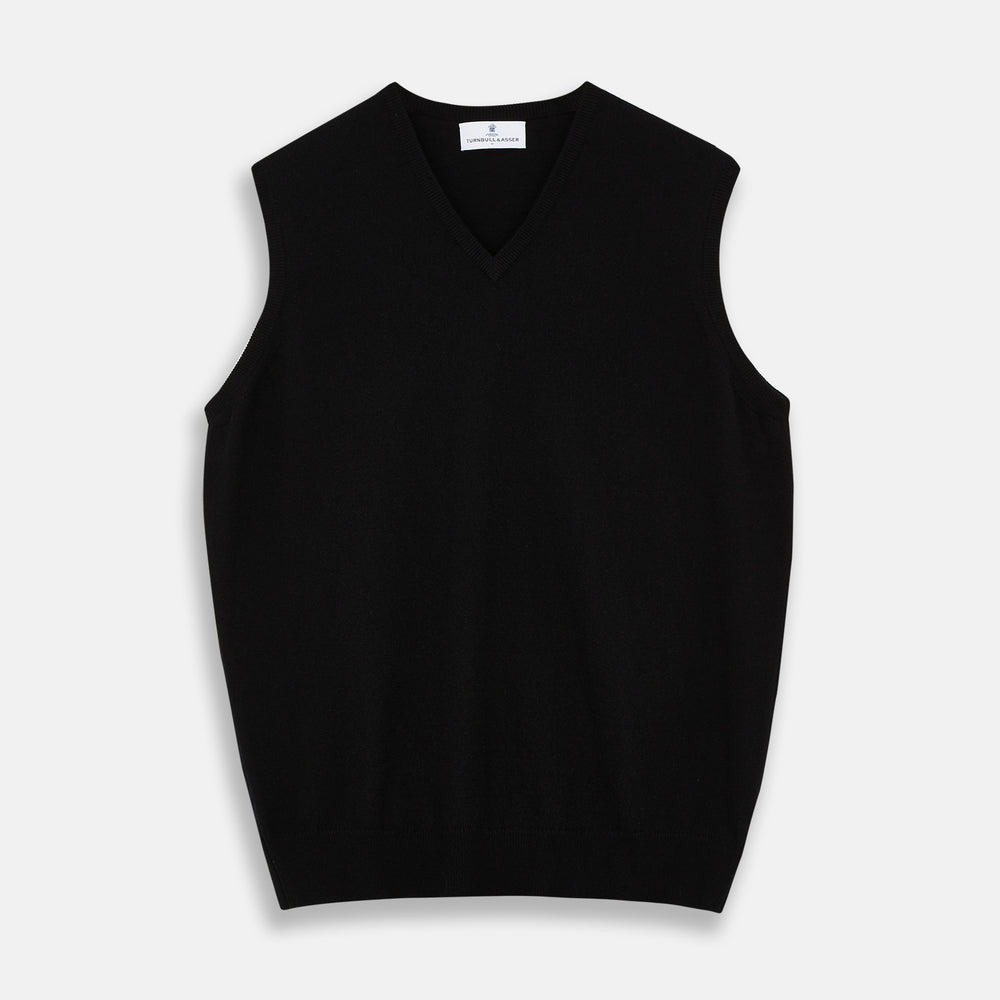 The Turnbull & Asser Black Cashmere Slipover, a sleeveless V-neck sweater vest made from pure cashmere, is shown flat against a white background.