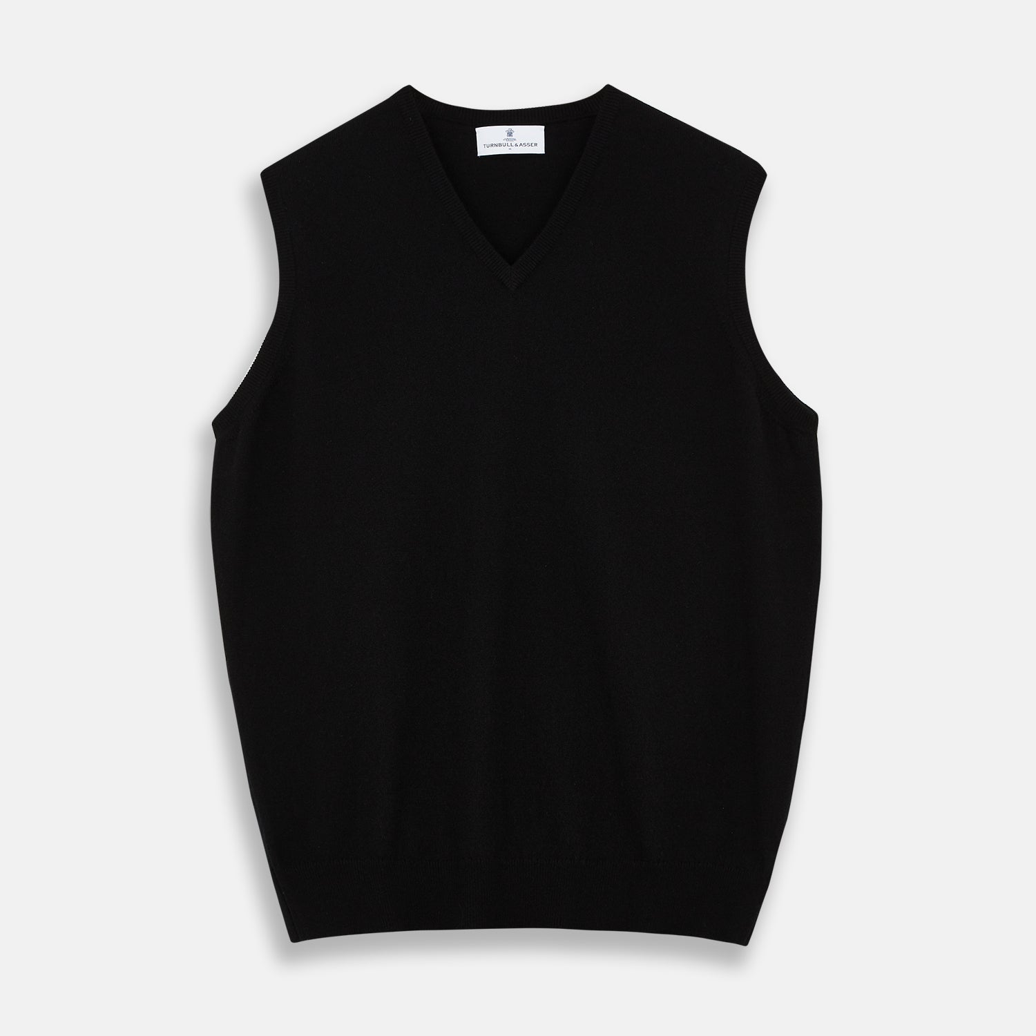 View 1 of product The Turnbull & Asser Black Cashmere Slipover, a sleeveless V-neck sweater vest made from pure cashmere, is shown flat against a white background.