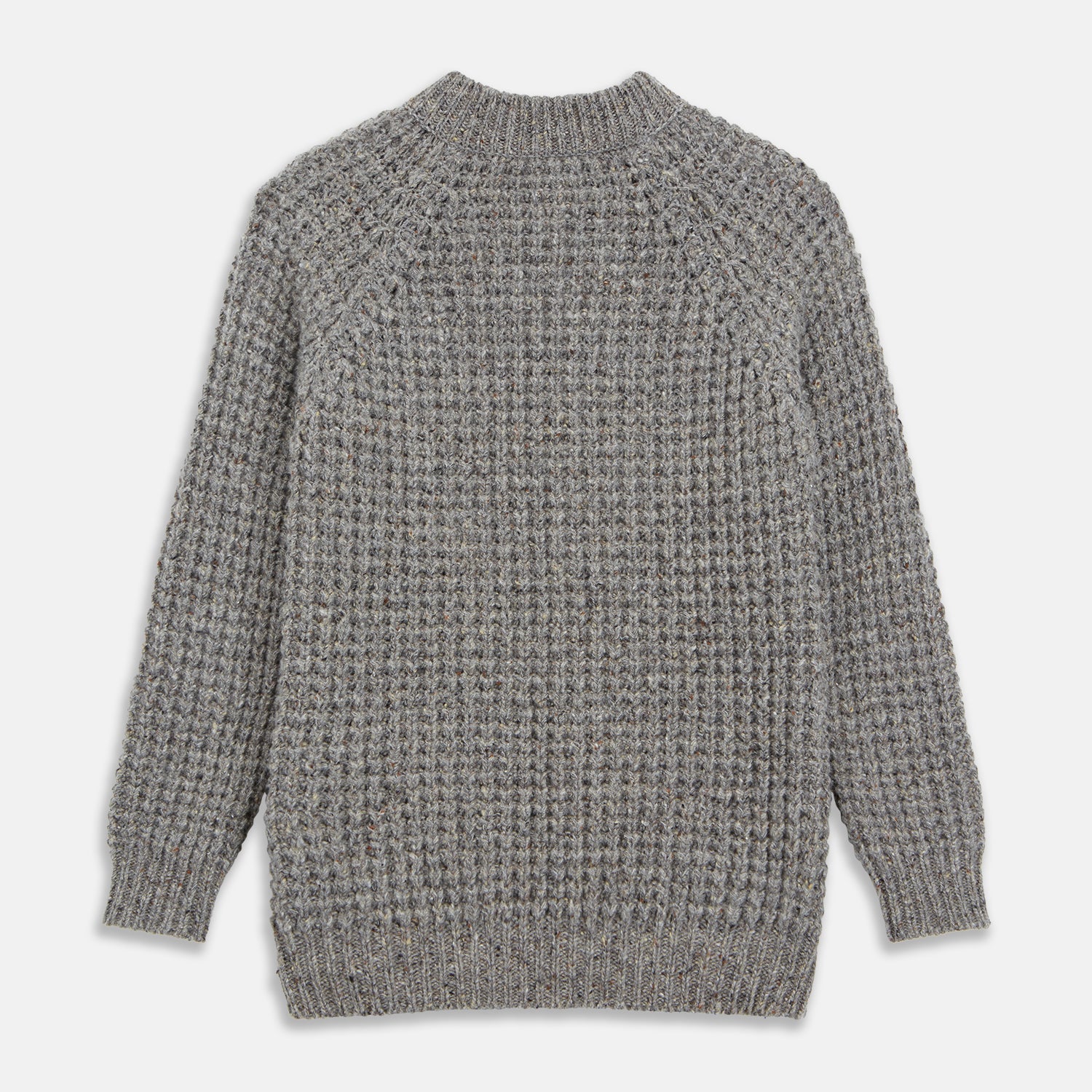 View 5 of product The Turnbull & Asser Merino Knitted Raglan Sleeve Crewneck Jumper in gray features intricate front and sleeve knit patterns, a high neckline, and long sleeves—an essential piece of men’s knitwear. Laid flat on a white background.