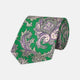 The Turnbull & Asser Green and Purple Large Paisley Printed Silk Tie features a light purple and white intricate paisley pattern, rolled up and set against a plain white background for timeless style.