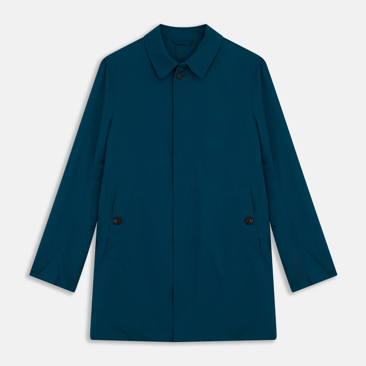 View 1 of product The Turnbull & Asser Blue Pack-Away Rain Mac is a knee-length coat with a classic collar, long sleeves, side buttoned pockets, and a concealed front placket, shown against a plain white background.