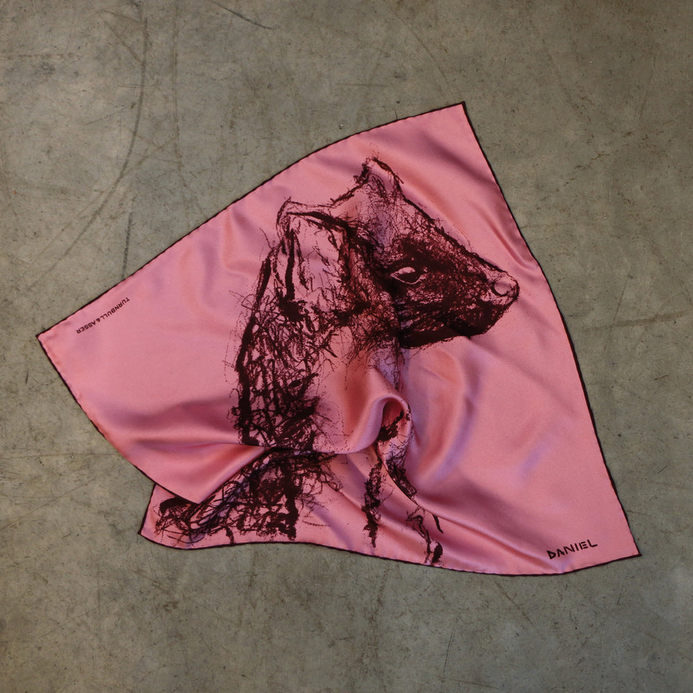 The DANIEL PERKIN PINK PINE MARTIN POCKET SQUARE by Turnbull & Asser features a detailed pine marten illustration, celebrating its elegance and significance in wildlife conservation.