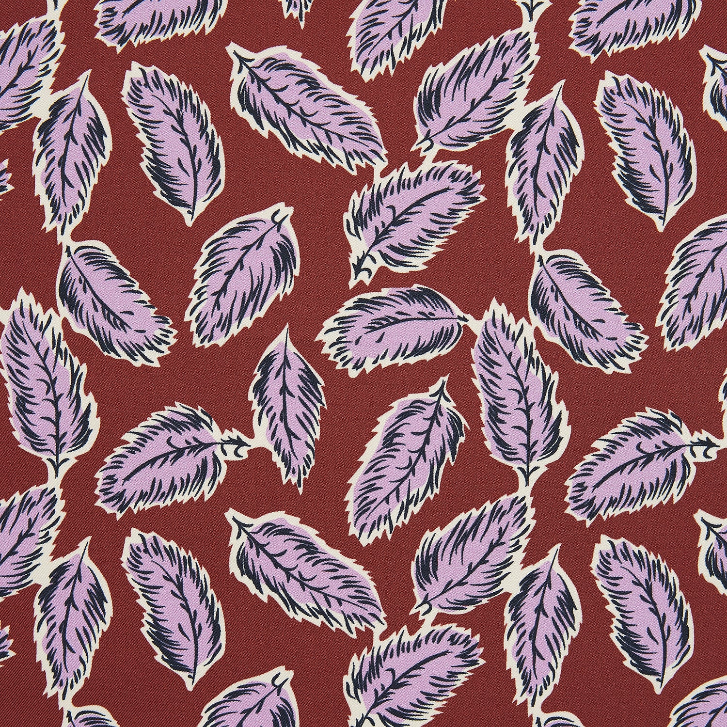 View 2 of product The Red Abstract Feather Print Silk Pocket Square by Turnbull & Asser features a dense purple and black feather pattern on red silk, accented with a discreet brand label—an elegant formal accessory.