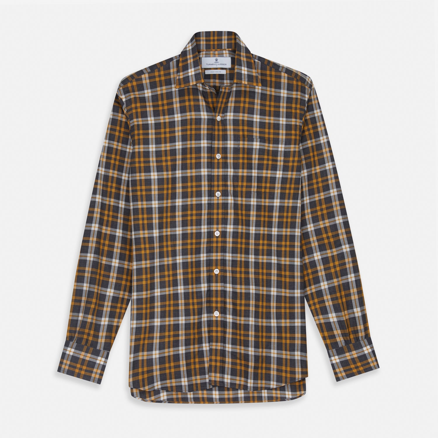 View 1 of product The Turnbull & Asser Yellow Check Weekend Fit Flannel Shirt features a Derby collar, 1-button cuffs, and a yellow, black, and white plaid pattern. It is shown laid flat on a white background.