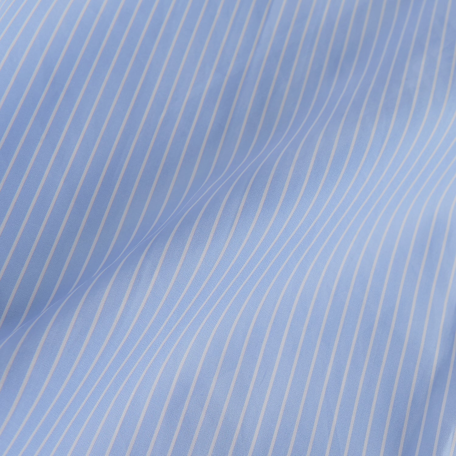 View 4 of product The Turnbull & Asser Powder Blue Stripe Tailored Fit Shirt features a Kent collar and 2-button cuffs, with powder blue and white vertical pinstripes, shown against a plain white background.