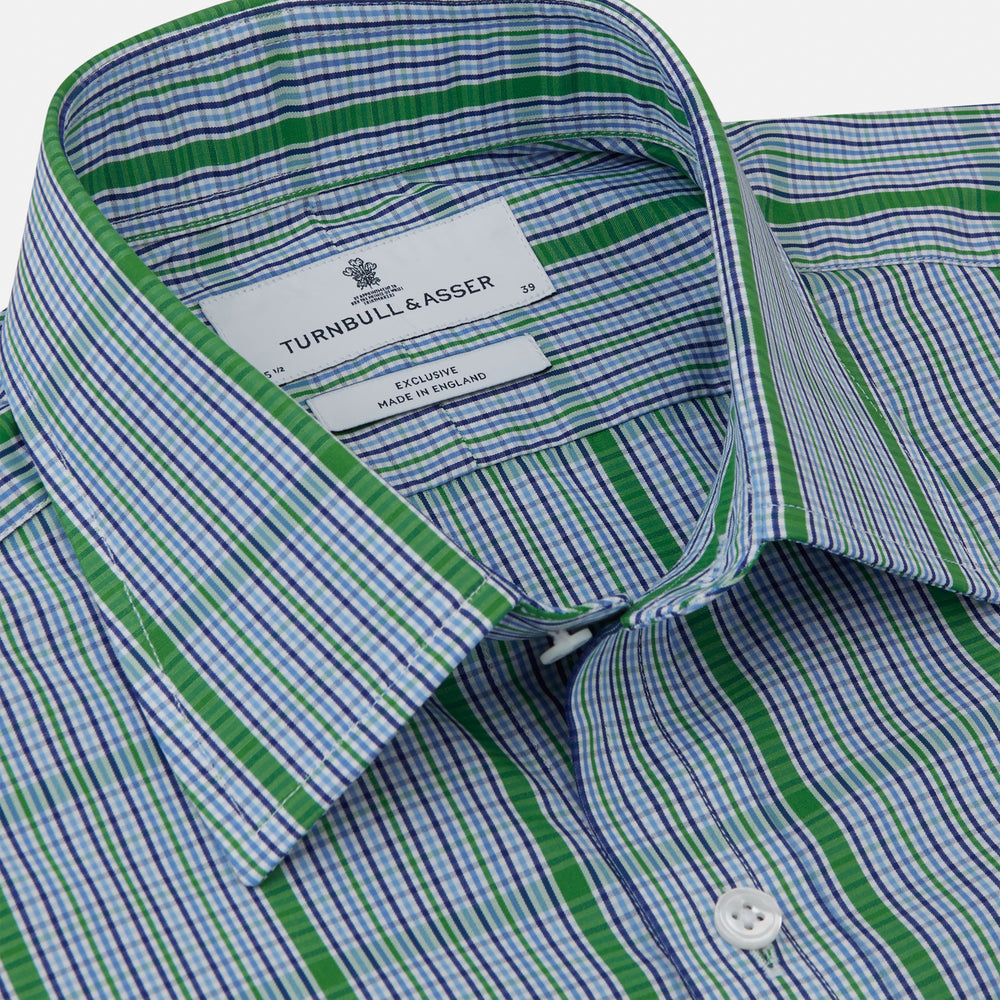 The Turnbull & Asser Green and Blue Fancy Check Regular Fit Shirt features a T&A collar and white buttons, displayed against a plain white background.