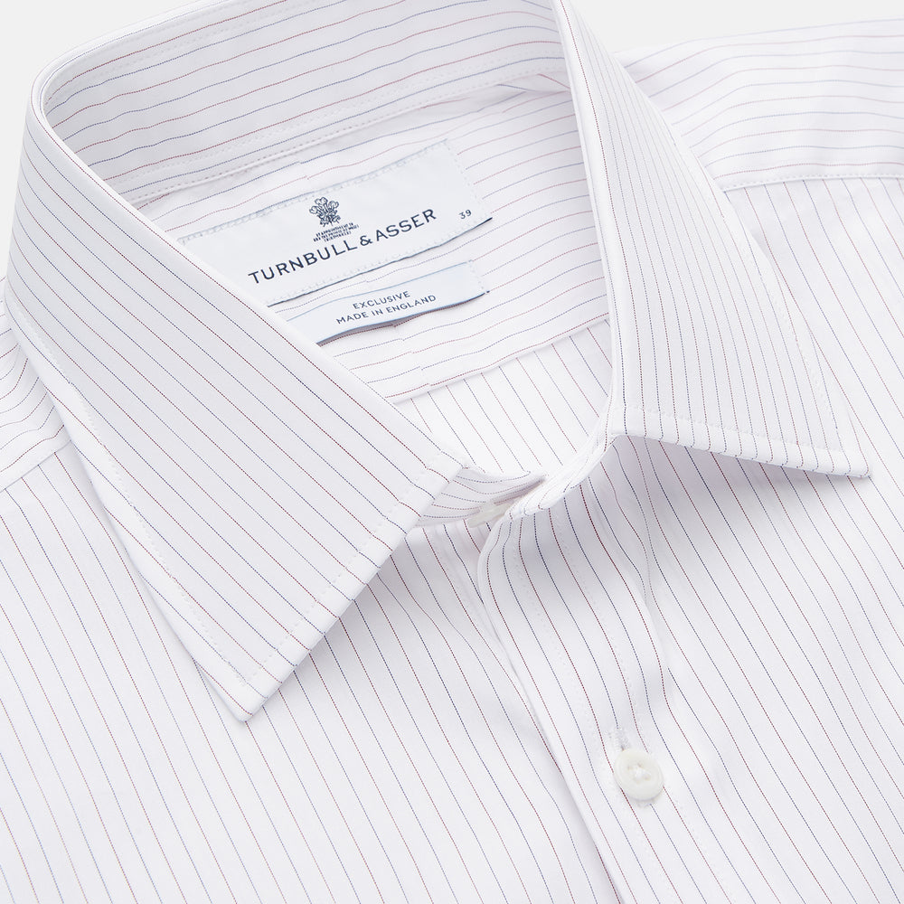 The Turnbull & Asser Red & White Stripe Sea Island Quality Cotton Regular Fit Mayfair Shirt features a classic T&A collar, button-down front, and buttoned cuffs, shown laid flat on a white background.