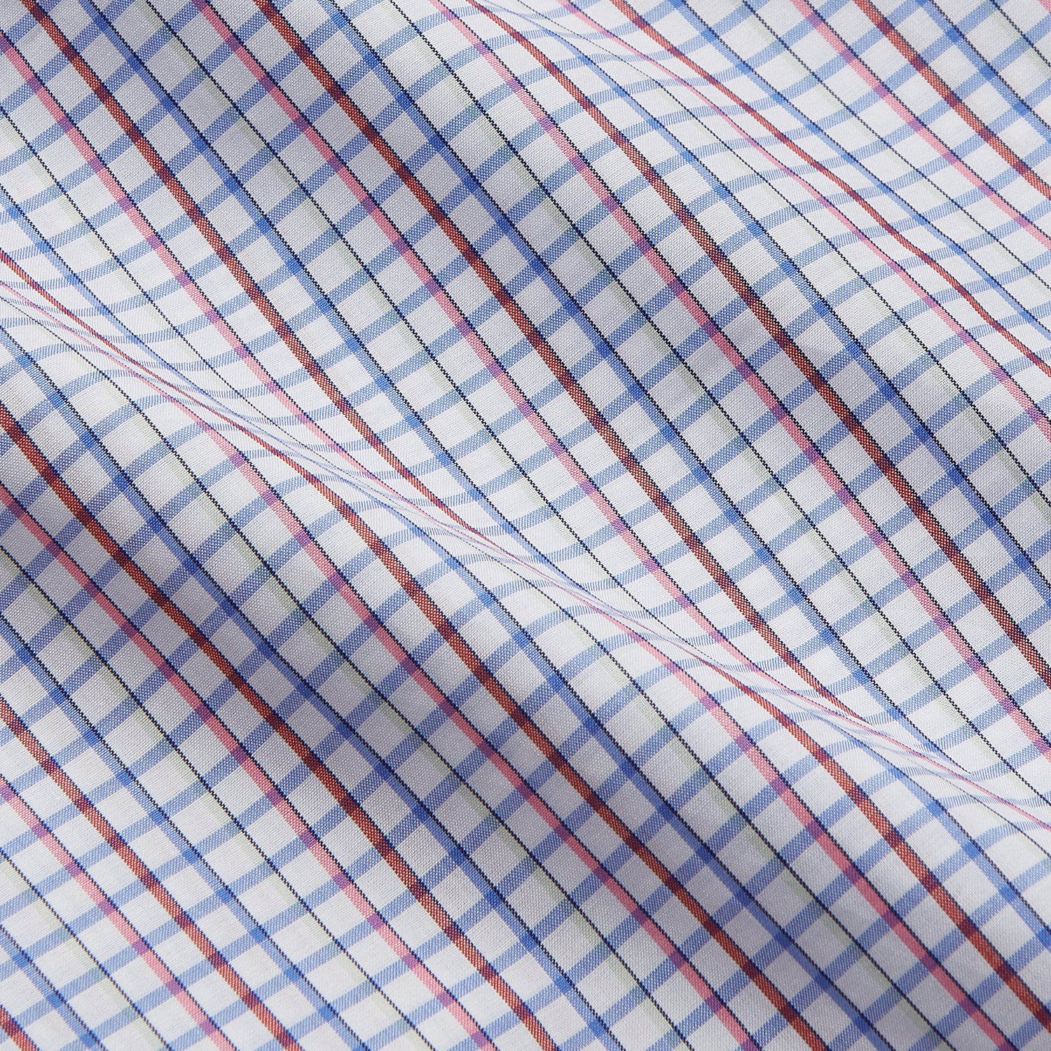 View 4 of product The Red Multi Blazer Check Regular Fit Mayfair Shirt by Turnbull & Asser features a T&A collar and long sleeves, showcasing a blue and red checkered pattern on white, set against a plain white backdrop.