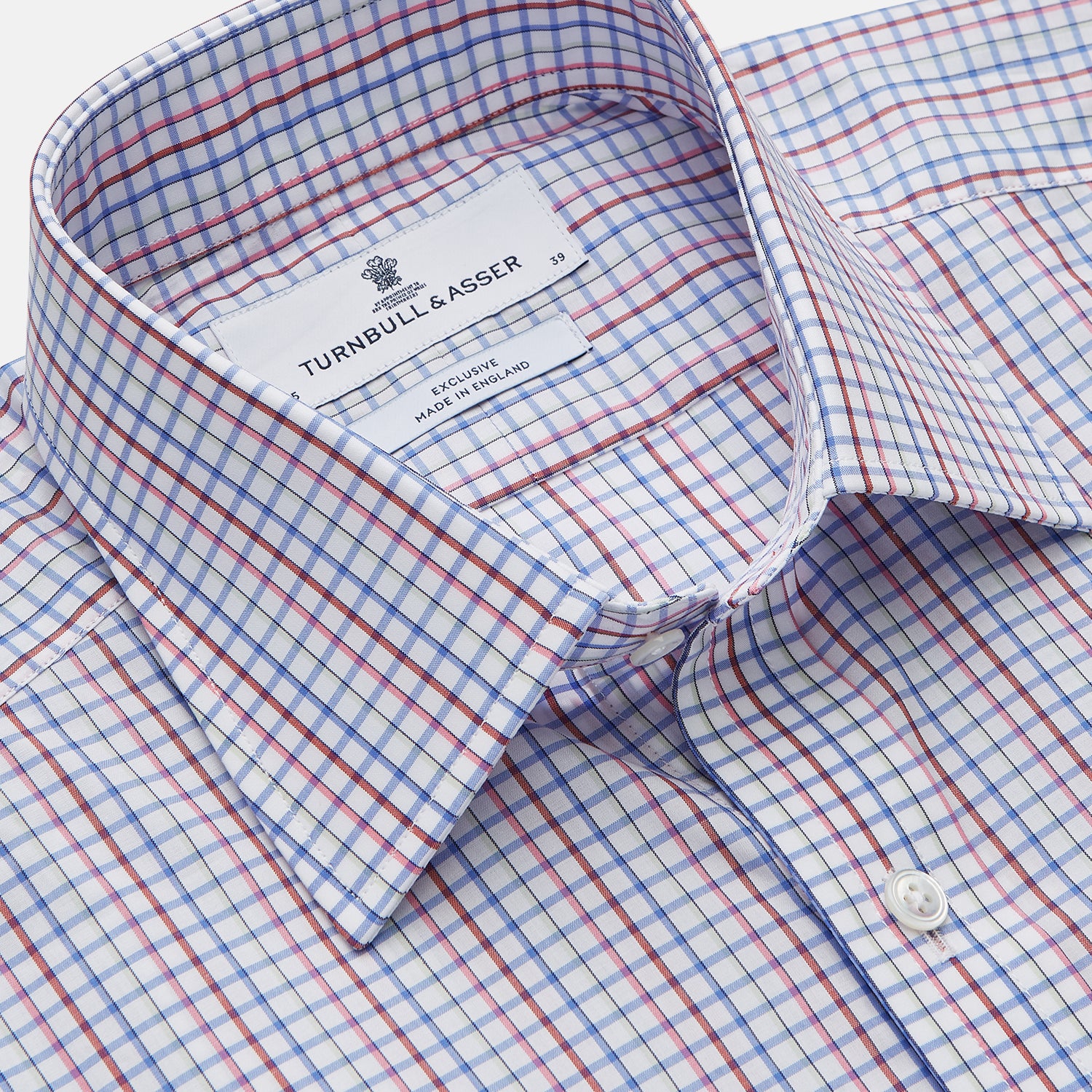 View 2 of product The Red Multi Blazer Check Regular Fit Mayfair Shirt by Turnbull & Asser features a T&A collar and long sleeves, showcasing a blue and red checkered pattern on white, set against a plain white backdrop.