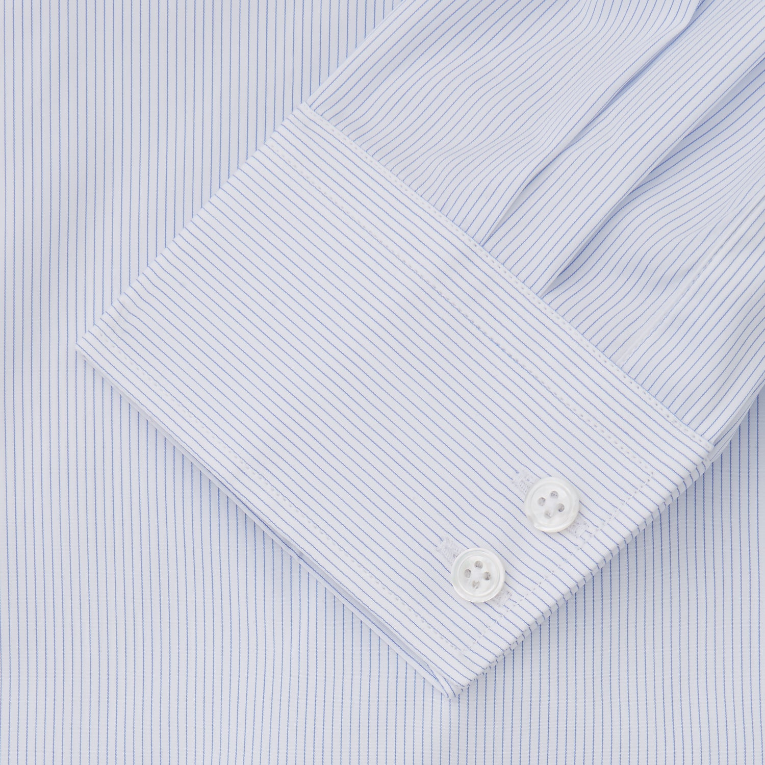 View 3 of product The Turnbull & Asser Sky Blue Bengal Stripe Tailored Fit Shirt features a Kent collar and 2-button cuffs, displayed neatly flat against a white background.