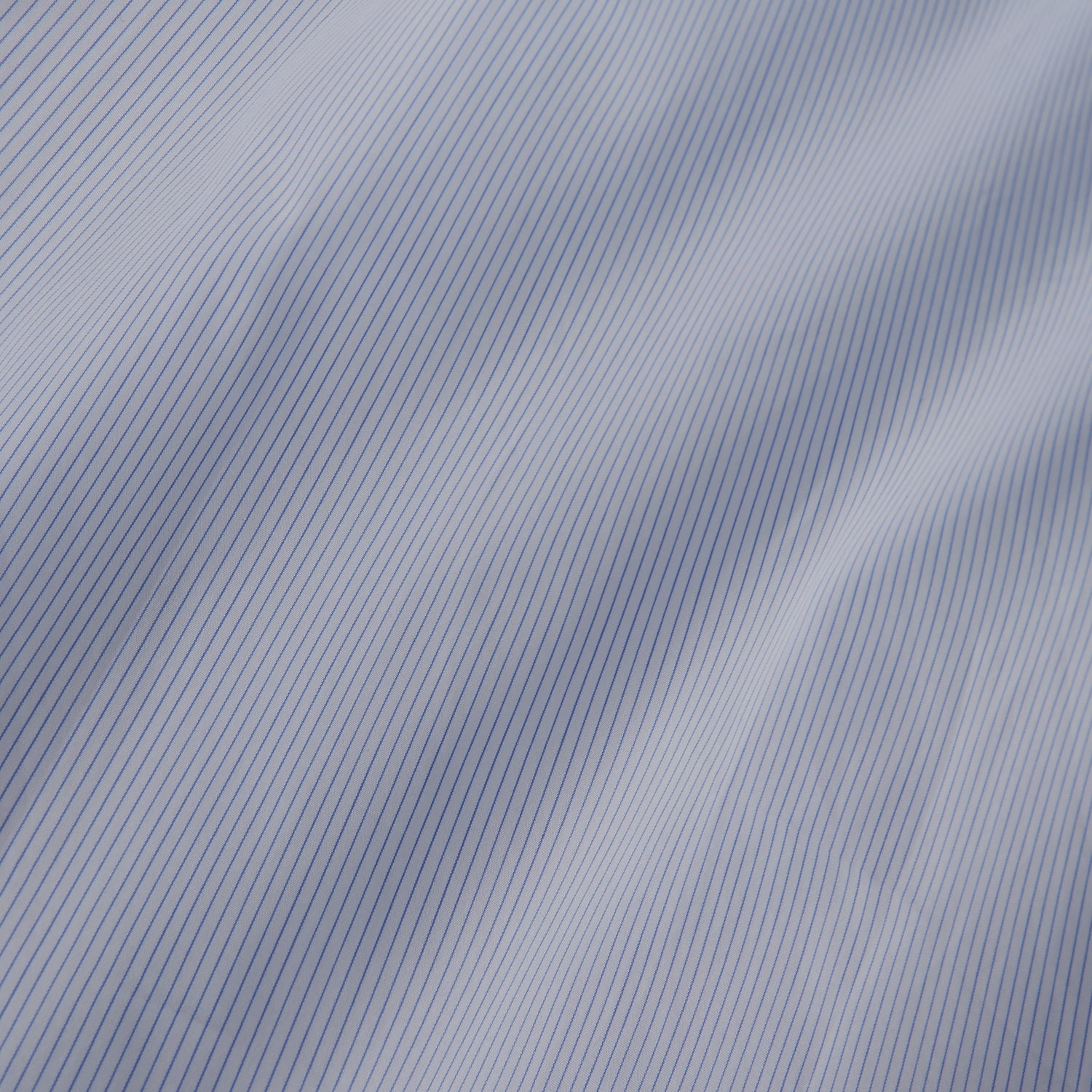 View 4 of product The Turnbull & Asser Sky Blue Bengal Stripe Tailored Fit Shirt features a Kent collar and 2-button cuffs, displayed neatly flat against a white background.