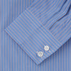 View 3 of product The Turnbull & Asser Oxford Blue Fancy Stripe Tailored Fit Shirt features white stripes, a Kent collar, and 2-button cuffs, shown on a plain white background.
