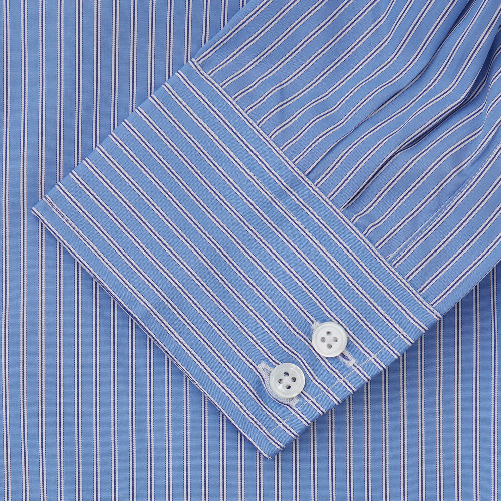 The Turnbull & Asser Oxford Blue Fancy Stripe Tailored Fit Shirt features white stripes, a Kent collar, and 2-button cuffs, shown on a plain white background.