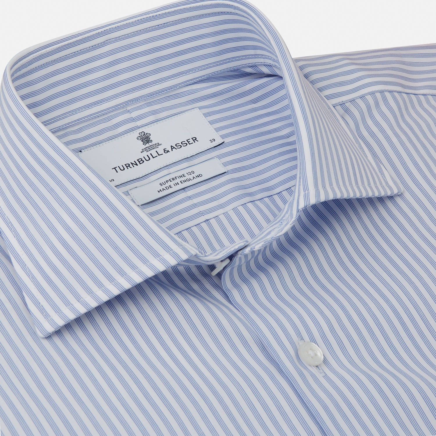View 2 of product The Turnbull & Asser Sky Blue and White Stripe Tailored Fit Shirt features a Kent collar, 2-button cuffs, and is crafted from fine Italian cotton, shown flat against a plain background.