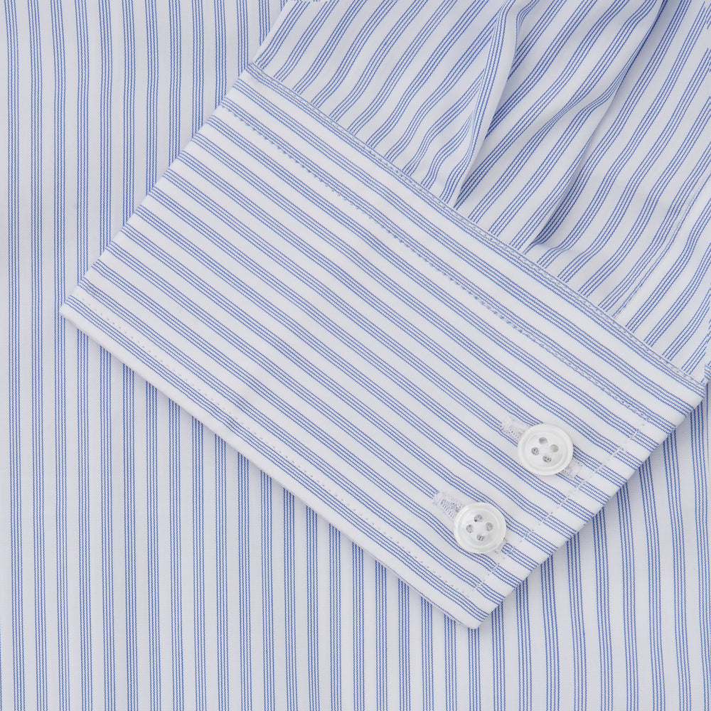 The Turnbull & Asser Sky Blue and White Stripe Tailored Fit Shirt features a Kent collar, 2-button cuffs, and is crafted from fine Italian cotton, shown flat against a plain background.