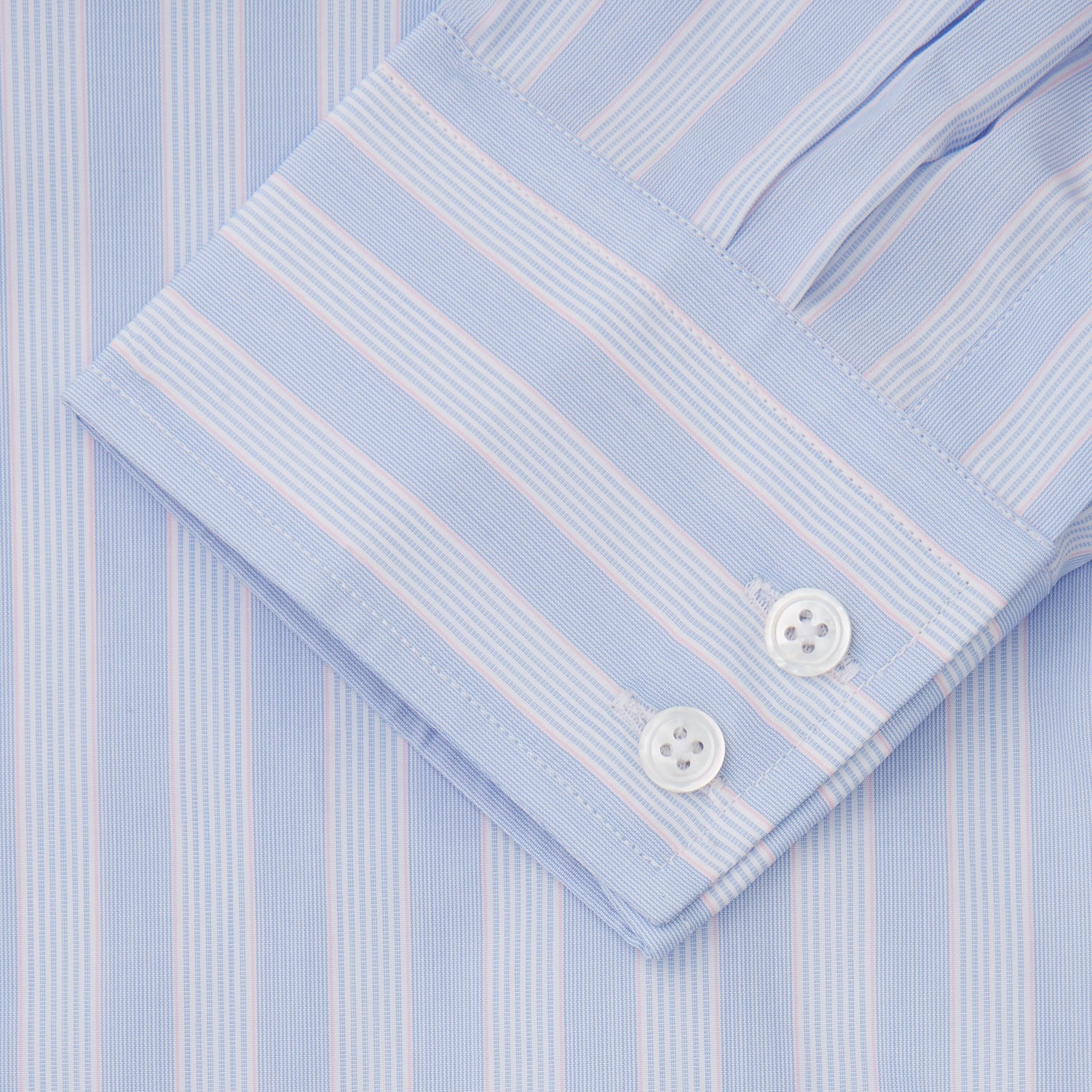 View 3 of product The Turnbull & Asser Pink and Blue Stripe Tailored Fit Shirt with a Kent collar is neatly laid flat on a plain white background.