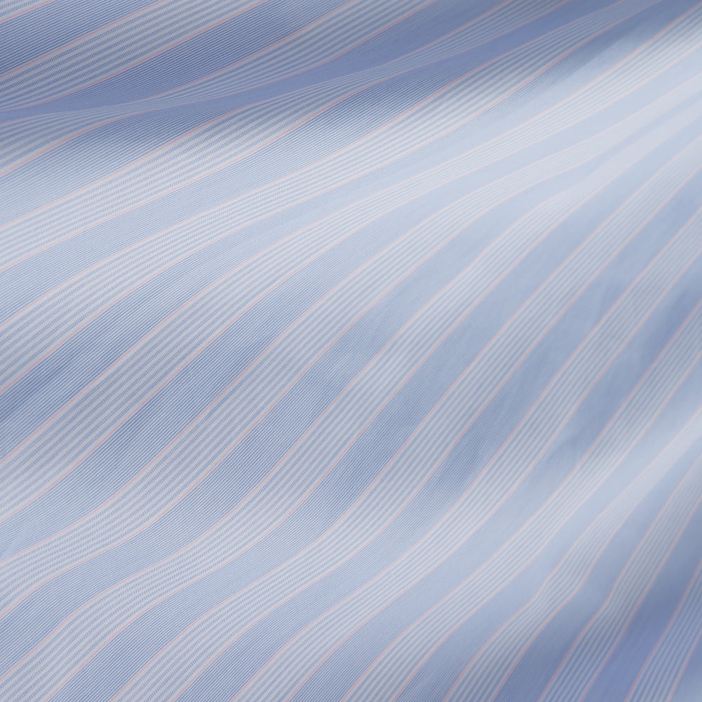 The Turnbull & Asser Pink and Blue Stripe Tailored Fit Shirt with a Kent collar is neatly laid flat on a plain white background.