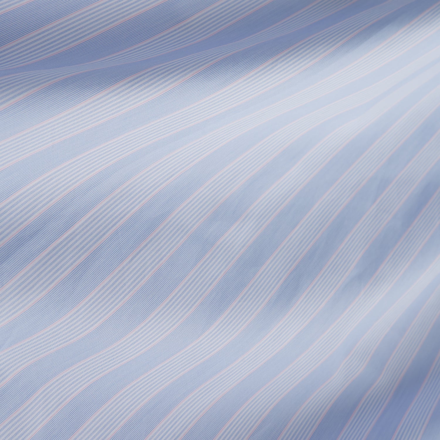View 4 of product The Turnbull & Asser Pink and Blue Stripe Tailored Fit Shirt with a Kent collar is neatly laid flat on a plain white background.