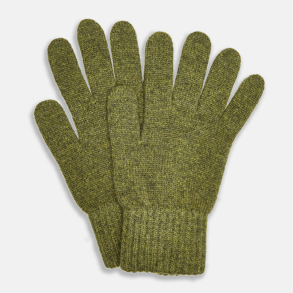 Turnbull & Asser's Green Multi Cashmere Gloves—an elegant Scottish knitwear piece—feature ribbed cuffs and an olive-toned design, showcased here laid flat on a white background.