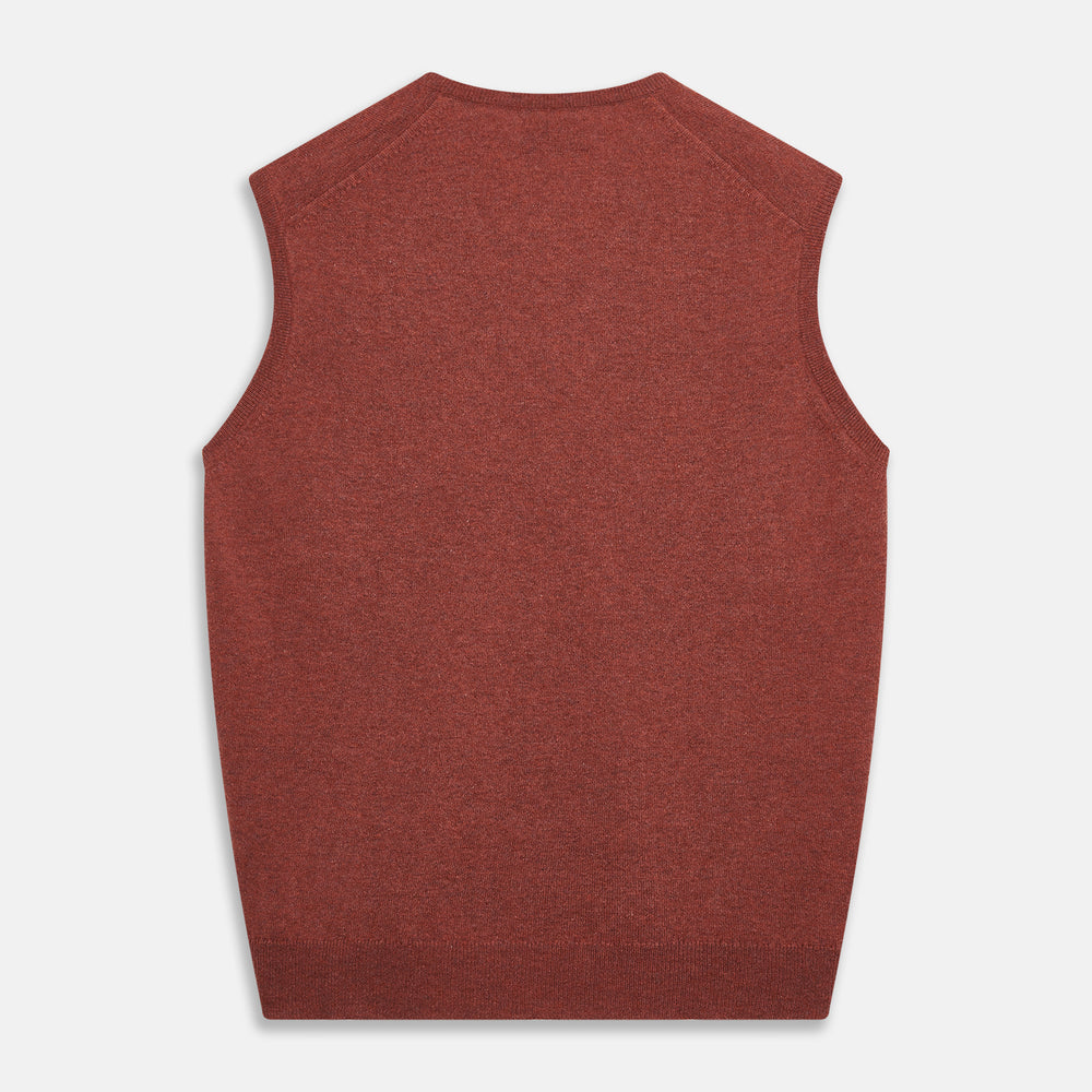 The Turnbull & Asser Burgundy Ifor Cashmere Slipover, a sleeveless V-neck design in fine knit, is shown laid flat on a white background; the neck lining displays a small label, highlighting its Scottish craftsmanship.