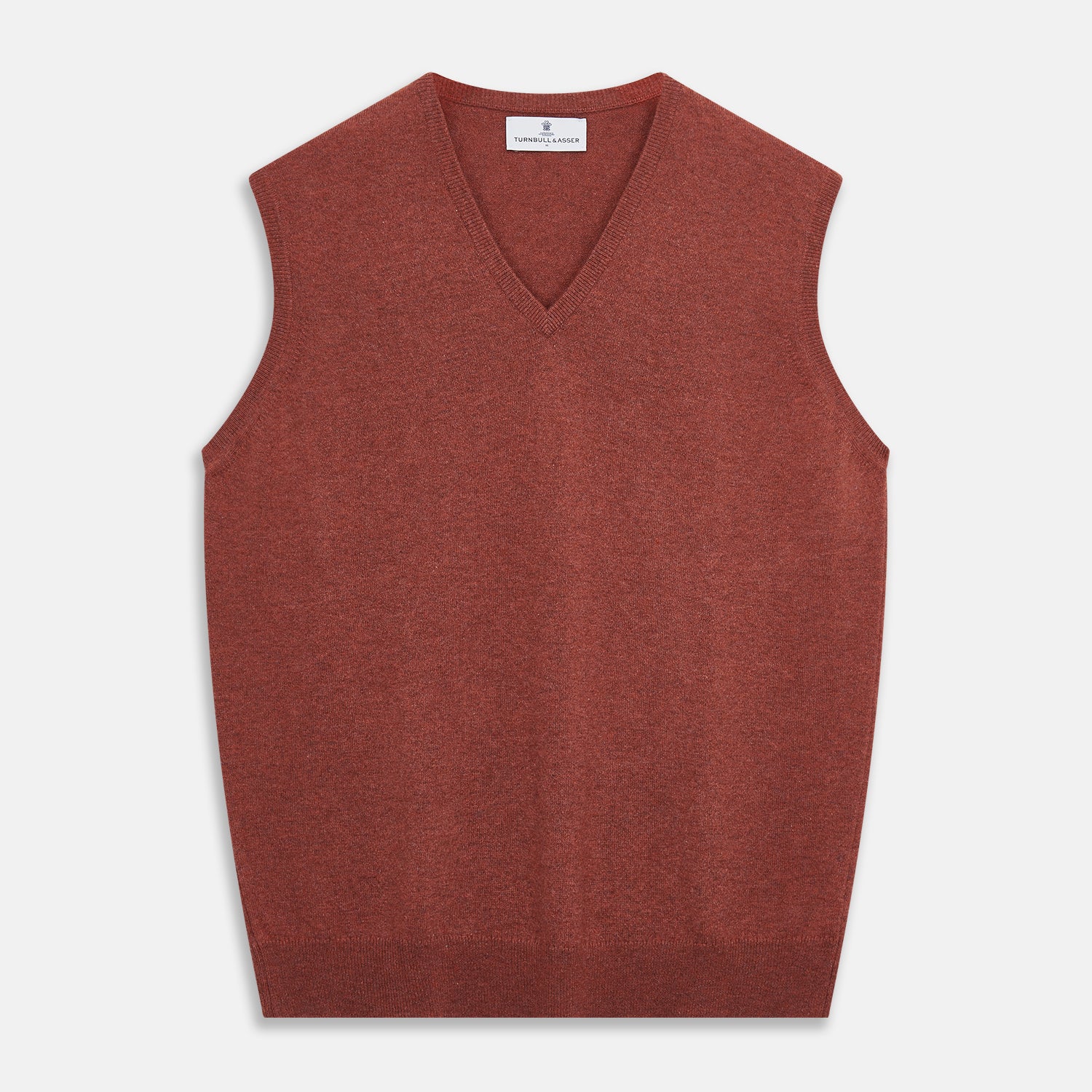 View 1 of product The Turnbull & Asser Burgundy Ifor Cashmere Slipover, a sleeveless V-neck design in fine knit, is shown laid flat on a white background; the neck lining displays a small label, highlighting its Scottish craftsmanship.