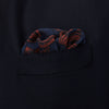 View 3 of product The Turnbull & Asser Navy Multi Camo Birds Wool Twill Pocket Square features a colorful camo bird pattern on navy wool twill with multicolor borders and a geometric edge design. Made in Italy.