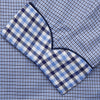 View 3 of product The Blue Multi Check Contrast Cotton Gown by Turnbull & Asser features long sleeves, a matching belt, front pocket, and contrasting checkered trim on the collar, cuffs, and pocket—offering a stylish, modern update to the classic gown.