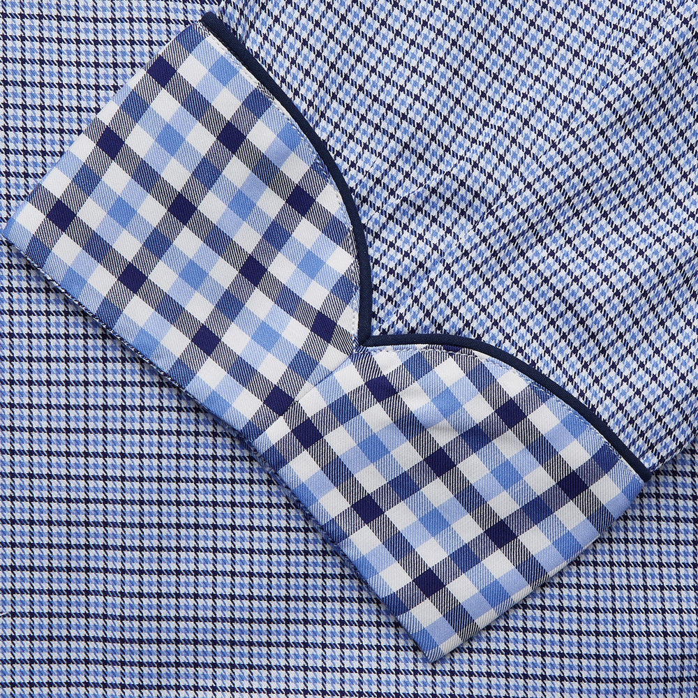 The Blue Multi Check Contrast Cotton Gown by Turnbull & Asser features long sleeves, a matching belt, front pocket, and contrasting checkered trim on the collar, cuffs, and pocket—offering a stylish, modern update to the classic gown.