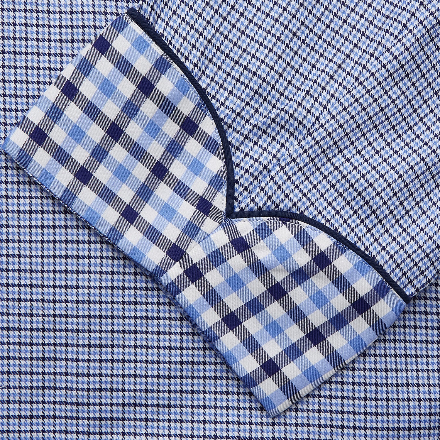 View 3 of product The Blue Multi Check Contrast Cotton Gown by Turnbull & Asser features long sleeves, a matching belt, front pocket, and contrasting checkered trim on the collar, cuffs, and pocket—offering a stylish, modern update to the classic gown.