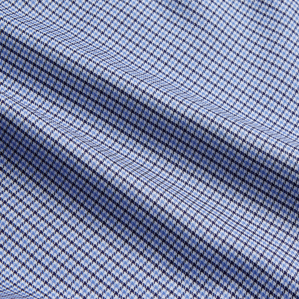The Blue Multi Check Contrast Cotton Gown by Turnbull & Asser features long sleeves, a matching belt, front pocket, and contrasting checkered trim on the collar, cuffs, and pocket—offering a stylish, modern update to the classic gown.