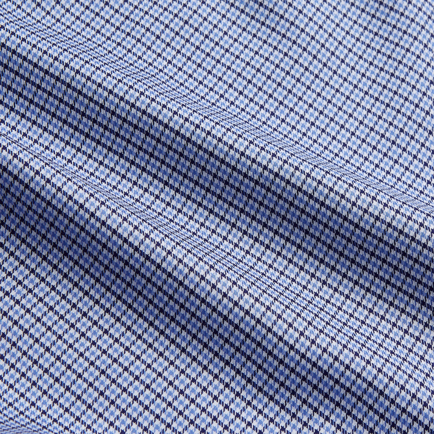 View 4 of product The Blue Multi Check Contrast Cotton Gown by Turnbull & Asser features long sleeves, a matching belt, front pocket, and contrasting checkered trim on the collar, cuffs, and pocket—offering a stylish, modern update to the classic gown.
