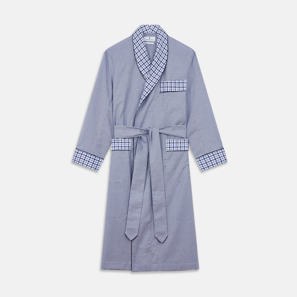 The Blue Multi Check Contrast Cotton Gown by Turnbull & Asser features long sleeves, a matching belt, front pocket, and contrasting checkered trim on the collar, cuffs, and pocket—offering a stylish, modern update to the classic gown.