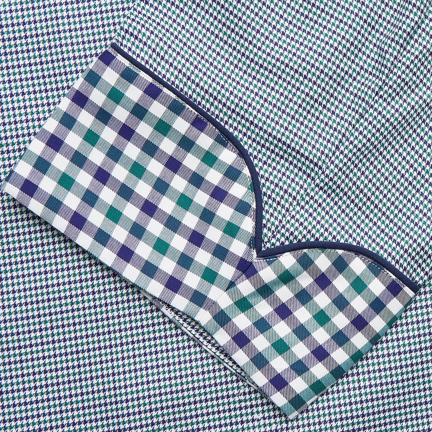 View 3 of product A Turnbull & Asser Green Multi Check Contrast Cotton Gown with a belt, featuring checkered trim on the collar, pocket, cuffs, and hem, laid flat on a white background.
