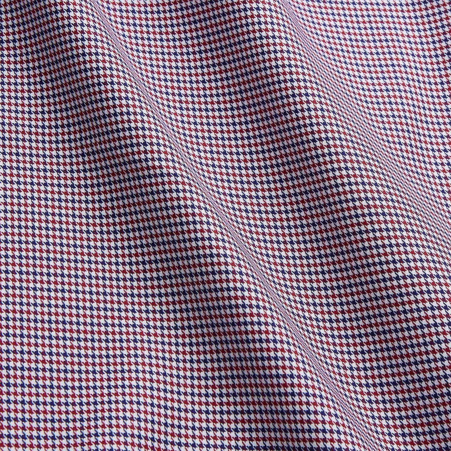 View 4 of product The Turnbull & Asser Burgundy Multi Check Contrast Cotton Gown features a long silhouette with a shawl collar, waist tie, and three pockets, accented by red, black, and white checkered trim—ideal for luxurious nights at home.