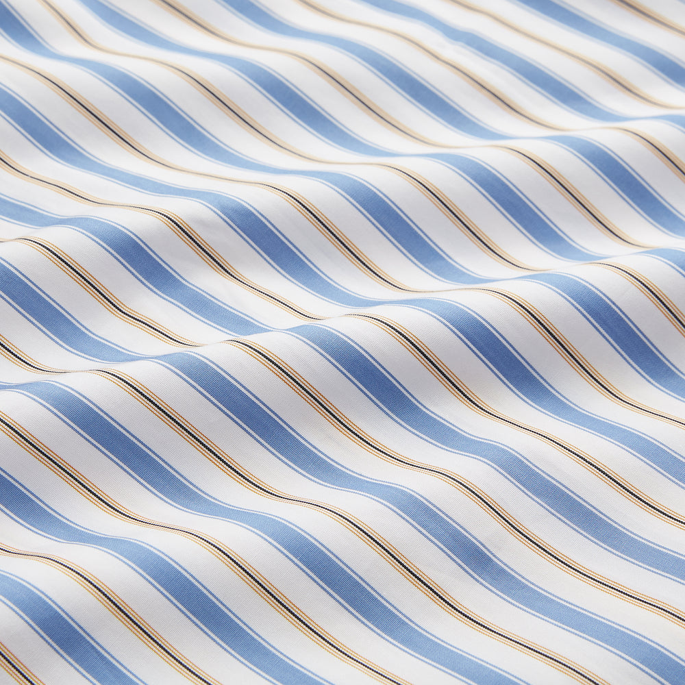 The Turnbull & Asser Blue Multi Stripe Regular Fit Shirt features a classic T&A collar, 3 button cuffs, and vertical blue, white, and yellow stripes for a timeless look.