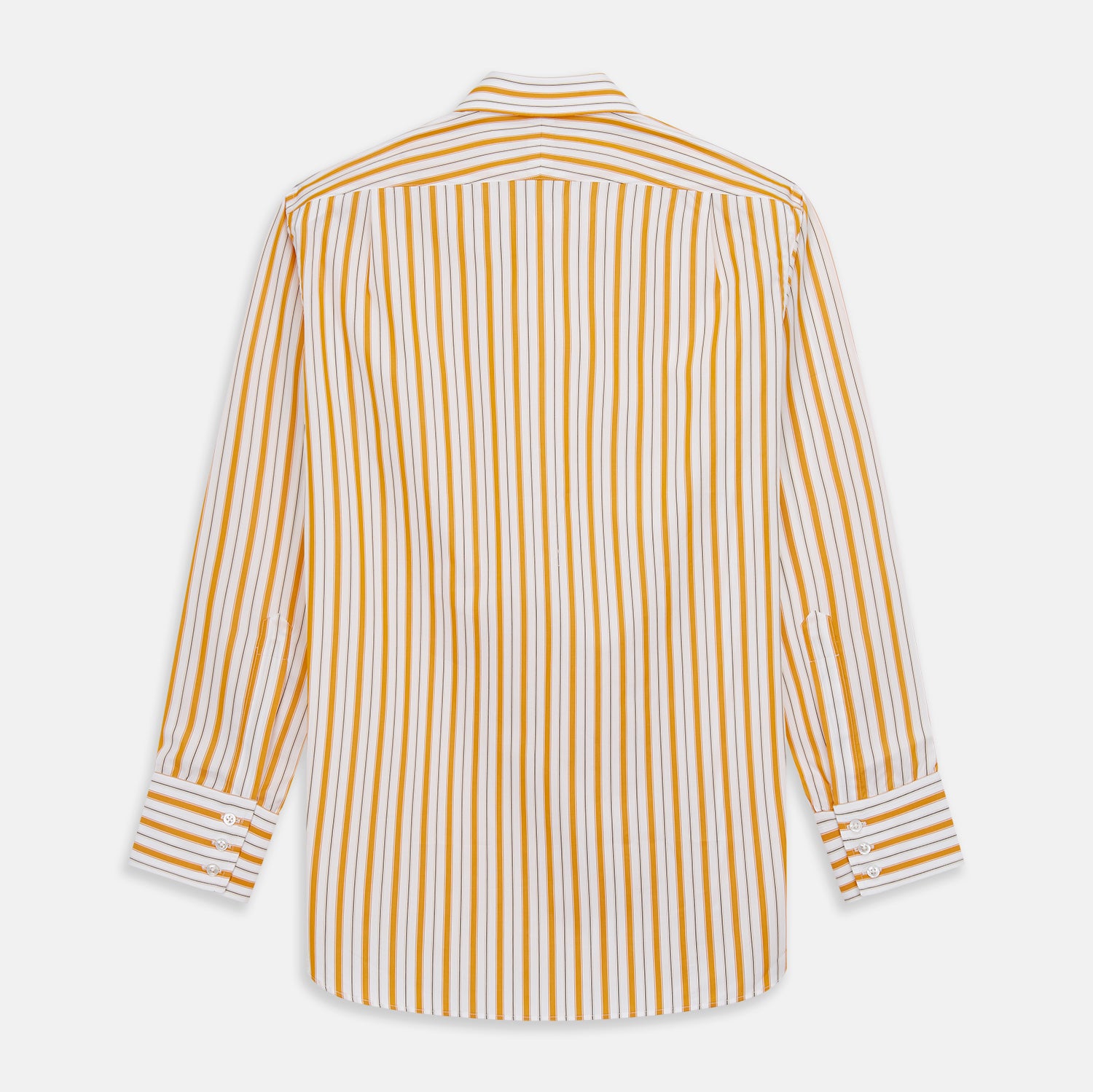 View 7 of product A man stands against a tan background wearing a Turnbull & Asser Orange Multi Stripe Regular Fit Shirt with T&A Collar and 3 Button Cuffs, paired with tan dress pants, brown belt, and brown shoes. He faces forward with a neutral expression.