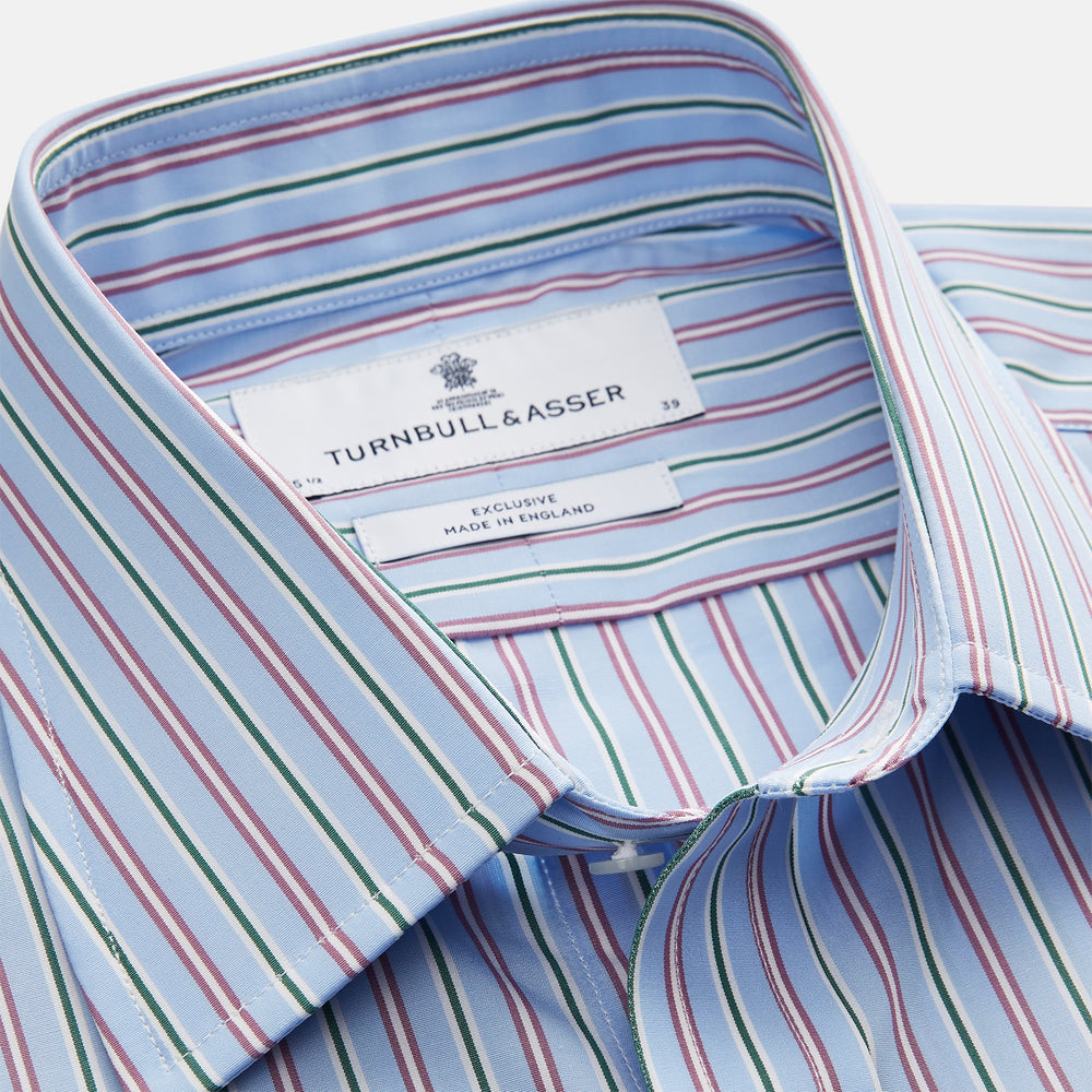 The Turnbull & Asser Blue, Purple & Green Stripe Regular Fit Shirt features a T&A collar and 3 button cuffs, laid flat on a white surface.