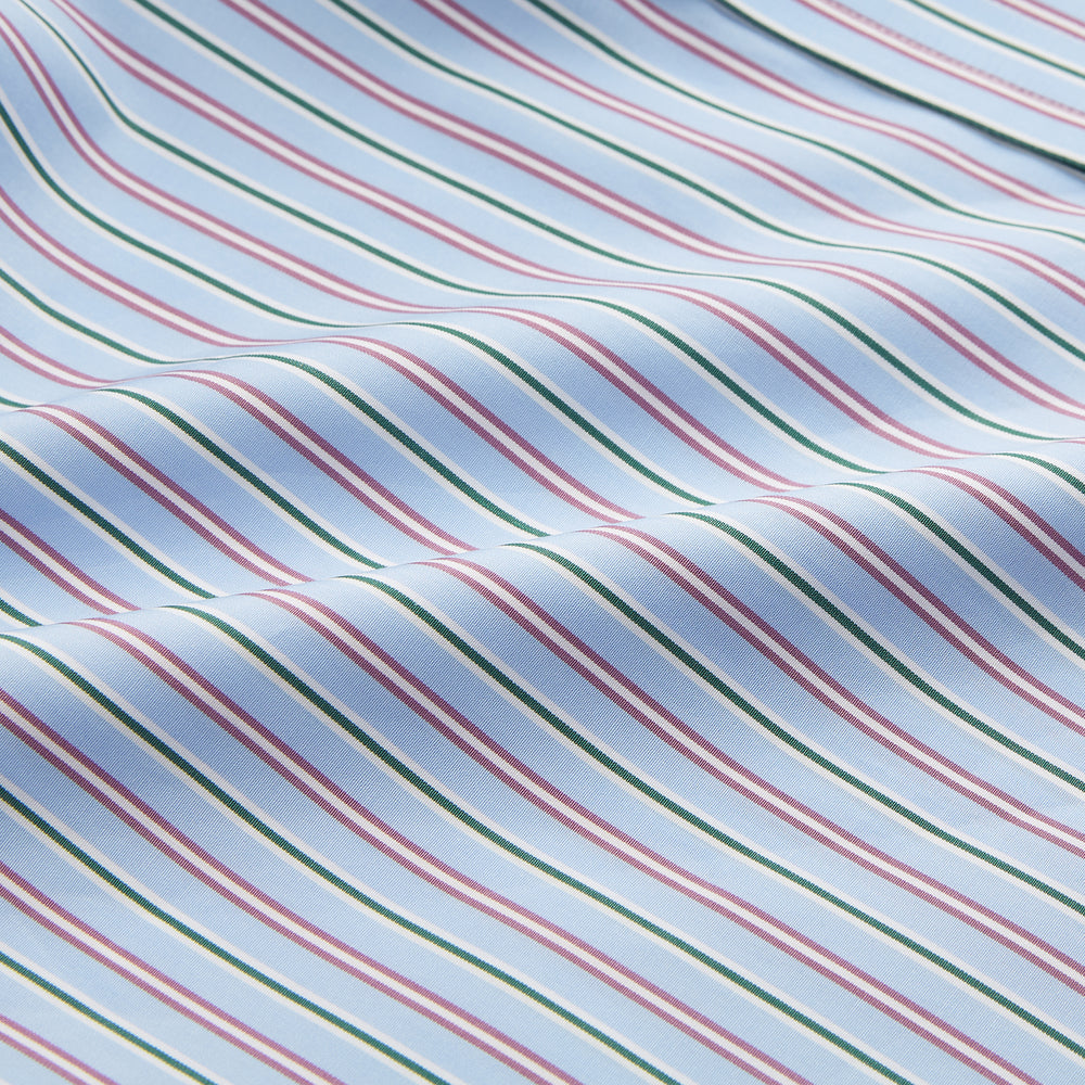 The Turnbull & Asser Blue, Purple & Green Stripe Regular Fit Shirt features a T&A collar and 3 button cuffs, laid flat on a white surface.