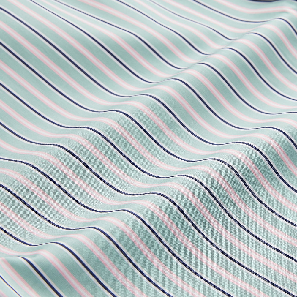 The Turnbull & Asser Green, Navy & Pink Stripe Regular Fit Shirt features a T&A collar, 3 button cuffs, and bold vertical stripes for a classic look.