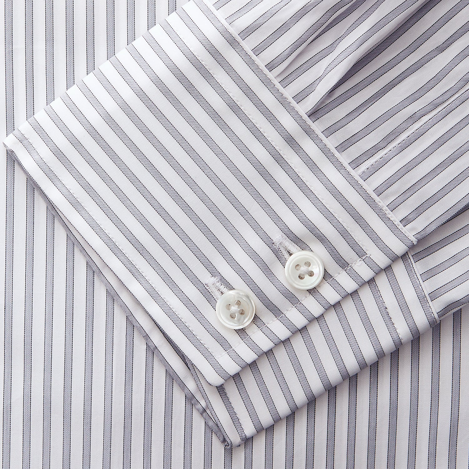 View 3 of product The Turnbull & Asser Grey Multi Stripe Tailored Fit Twill Shirt features a Kent collar and 2 button cuffs, displayed flat on a white background.