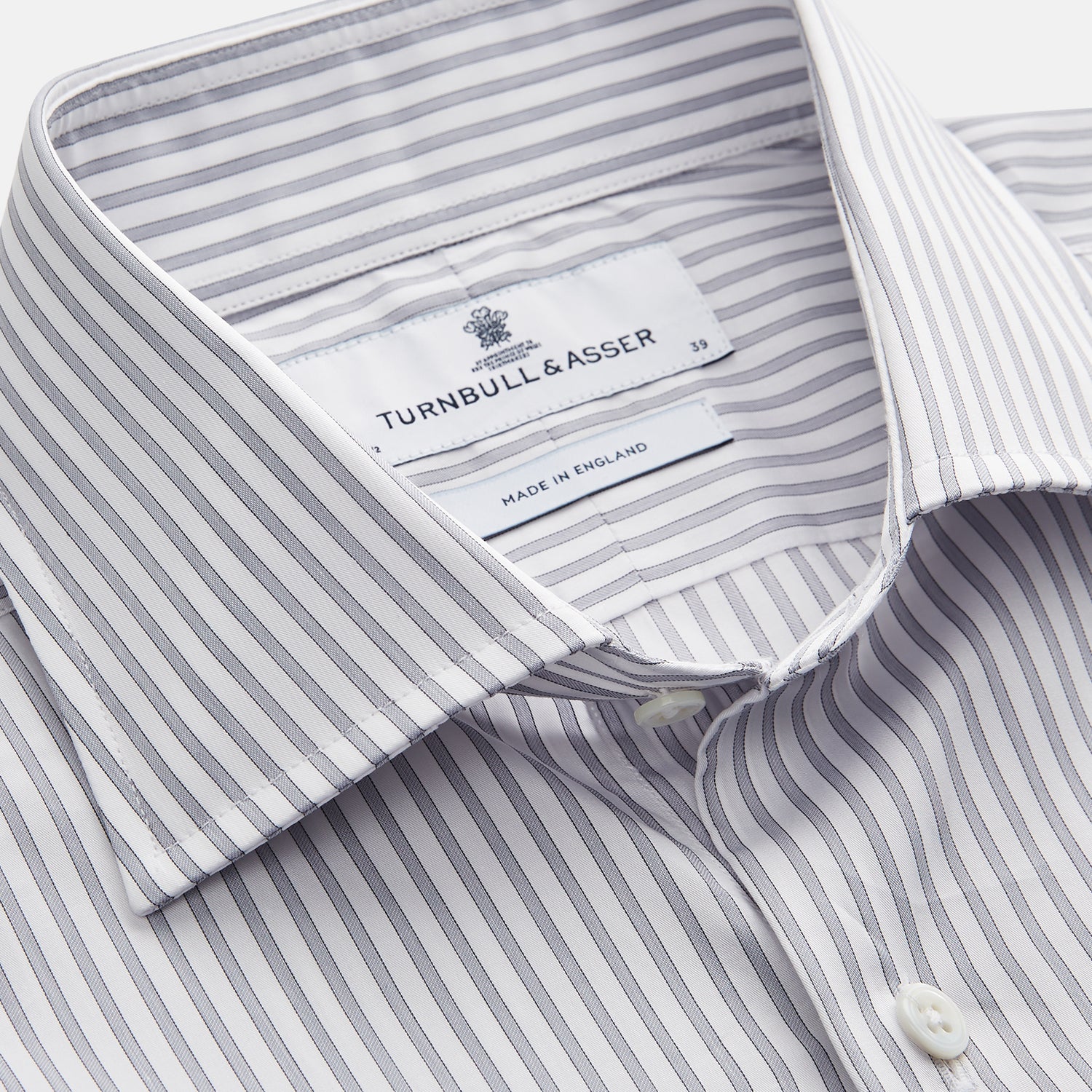 View 2 of product The Turnbull & Asser Grey Multi Stripe Tailored Fit Twill Shirt features a Kent collar and 2 button cuffs, displayed flat on a white background.