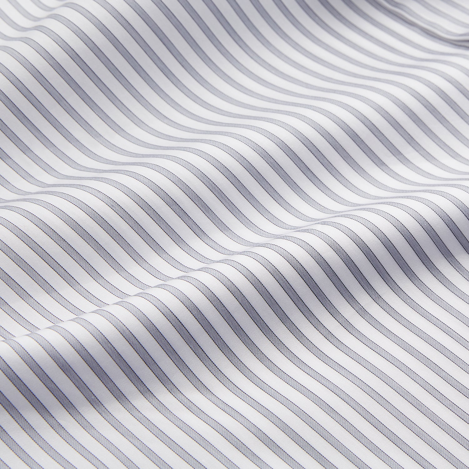 View 4 of product The Turnbull & Asser Grey Multi Stripe Tailored Fit Twill Shirt features a Kent collar and 2 button cuffs, displayed flat on a white background.