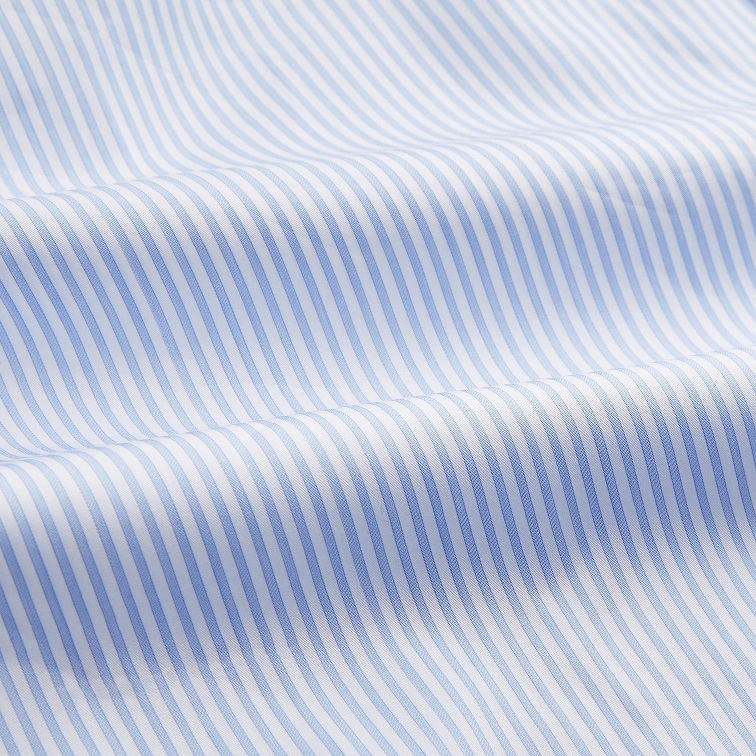 View 4 of product Turnbull & Asser Blue Multi Stripe Tailored Fit Twill Shirt features a Kent collar, 2 button cuffs, and white buttons. Crafted from Italian cotton, it's displayed flat on a white background.