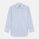 The Turnbull & Asser Blue Multi Blazer Stripe Regular Fit Mayfair Shirt features light blue and white vertical stripes, a signature Mayfair collar, and is neatly displayed on a white background.