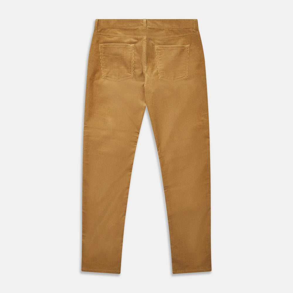 The Caramel Cord Mylo Trousers by Turnbull & Asser, slim-fit with a five-pocket design, are displayed flat on a white background.