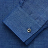 View 3 of product The Turnbull & Asser Navy Linen Weekend Fit Blake Shirt features long sleeves and a stand collar, shown here laid flat on a white background.